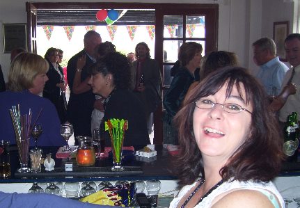 Elaine behind the bar